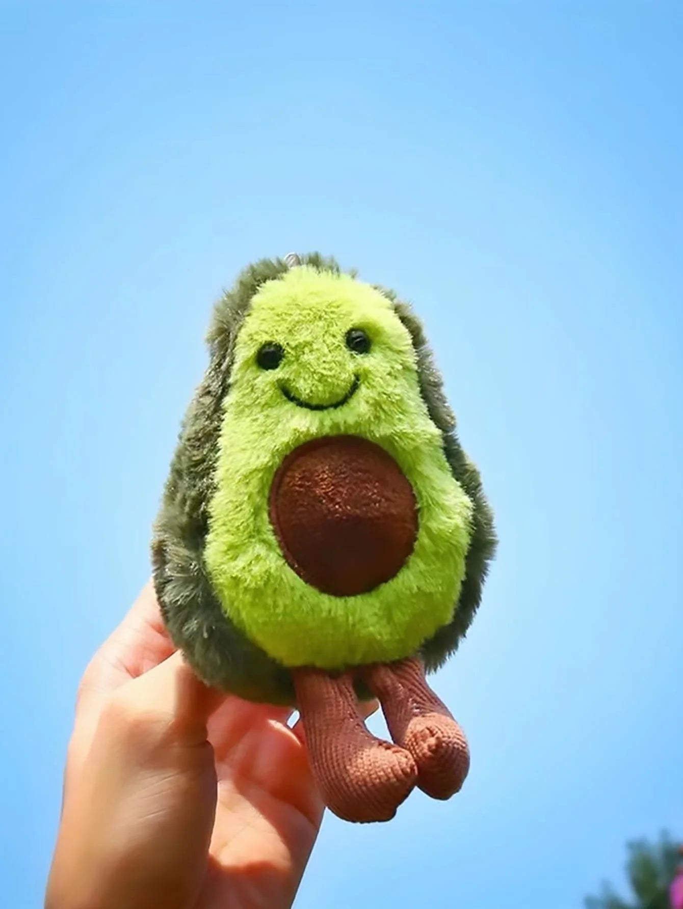 A cute avocado pet plush